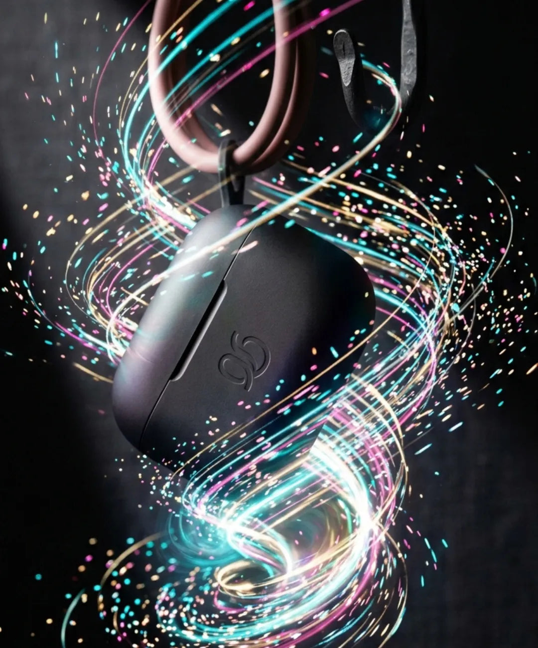 Vertical product photography of a fitness accessory with dynamic light particles and motion energy around it, dark dramatic background, sense of a fresh new launch, no text, no people, 9:16 aspect ratio, high-energy commercial photography